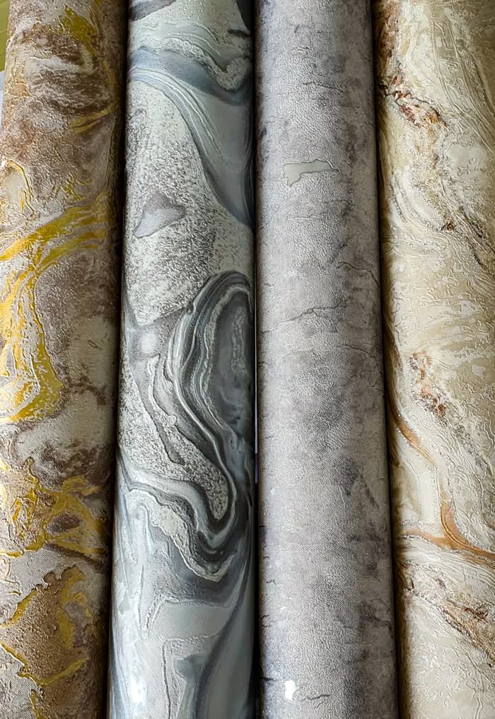 A collection of elegant marble textures in neutral tones, perfect for backgrounds and design projects.