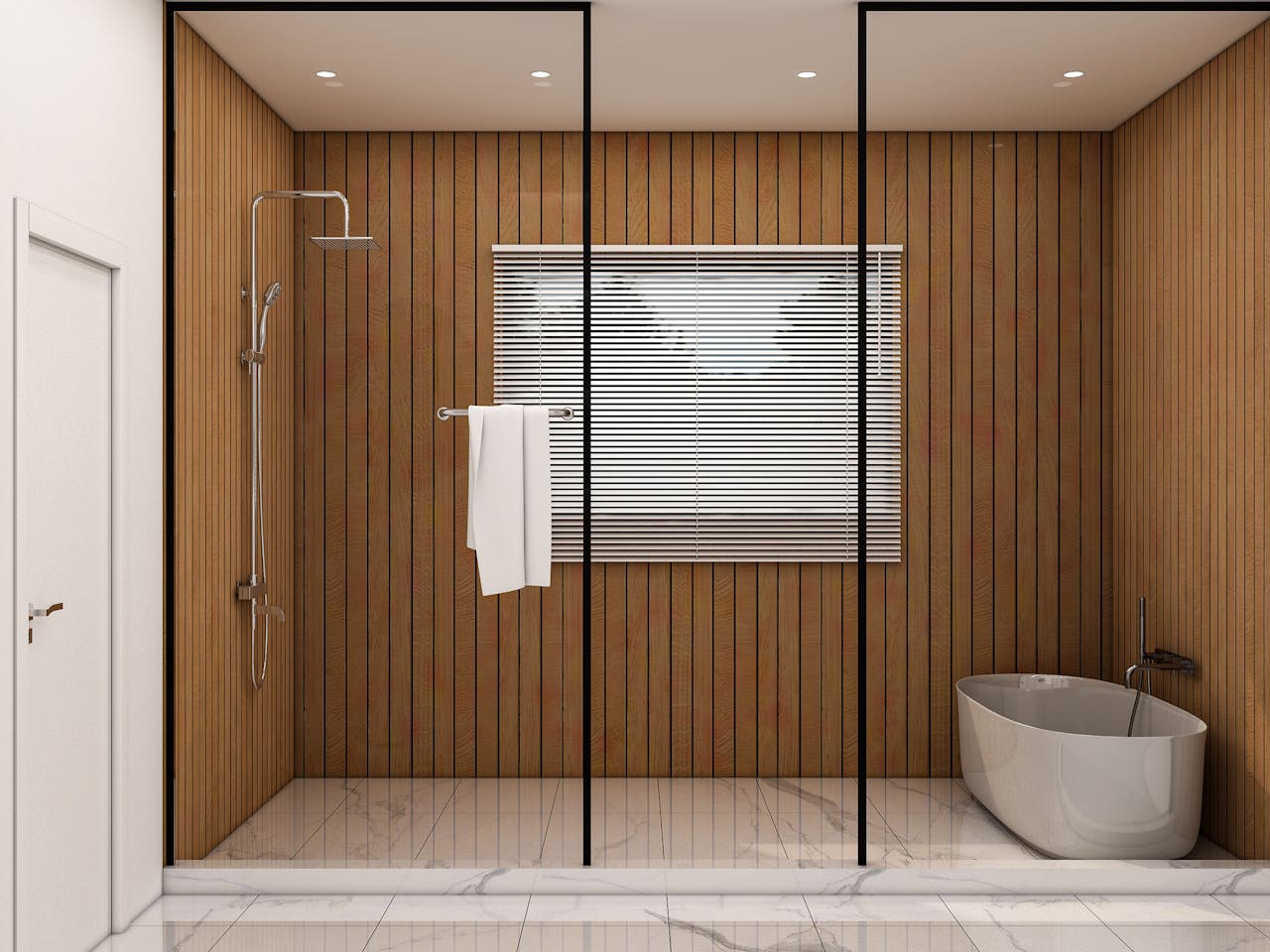 our-experience A sleek modern bathroom design featuring wood panel walls, a freestanding bathtub, and a glass shower partition.